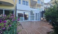 AL-1793, Квартира 2+1 (55 м²) с видом на море в районе Кале (Алания) — кухня в американском стиле, две ванные комнаты, 600 м до моря