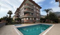 AL-1798, Меблированная квартира 2+1 (120 м²) с кухней в американском стиле в районе Сугозу, Аланья — бассейн, сад и круглосуточная охрана