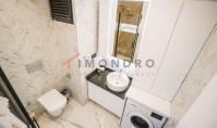 AL-1852, Полностью меблированная квартира 1+1 (55 м²) на 3-м этаже с бассейном, сауной, фитнес-залом и джакузи, в 200 м от моря — Алания, Хаджет