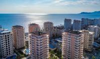 AL-2259, Вид на море из меблированной квартиры площадью 125 м² (2+1) с двумя просторными балконами в комплексе с сауной и тренажерным залом, Махмутлар