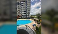 AL-2336, Квартира площадью 130 м² с планировкой 2+1, из которой открывается вид на бассейн, с застеклённым балконом и 2 ванными комнатами, Махмутлар (с возможностью получения гражданства)