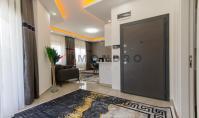 AL-2379, Квартира площадью 50 м² с планировкой «1+1» на 1-м этаже, с дизайнерской мебелью, бассейном и тренажерным залом, в 1 км от моря, Махмутлар
